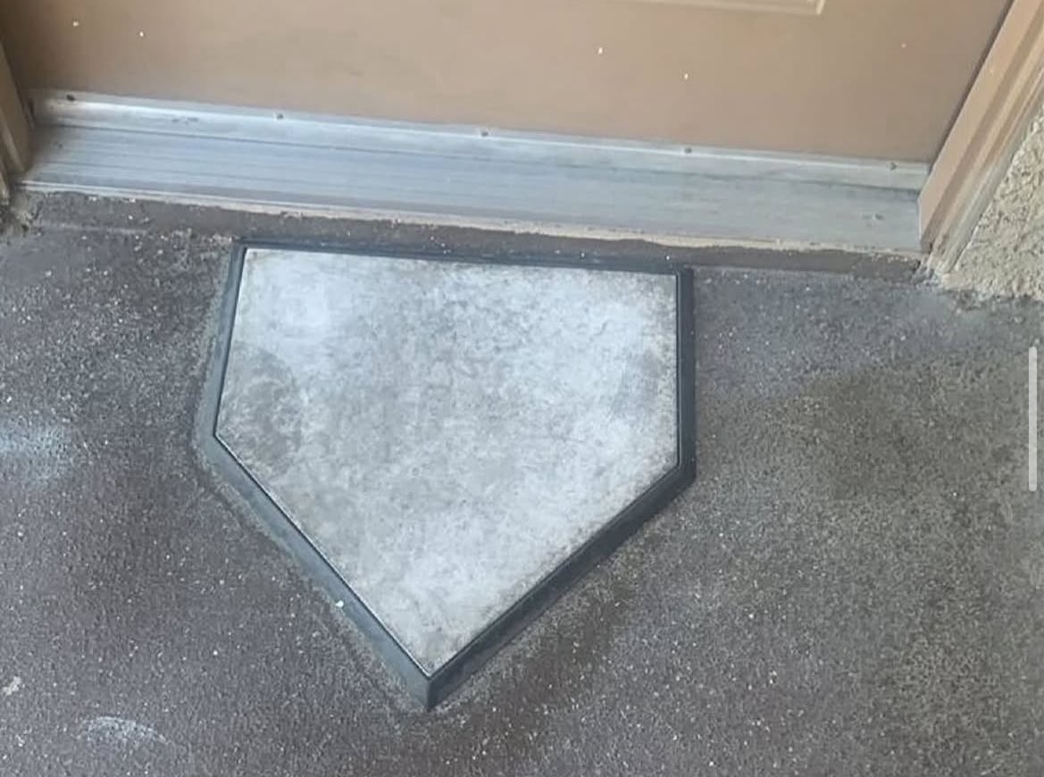A homeplate instead of a welcome mat.  I’m so down for this trend.