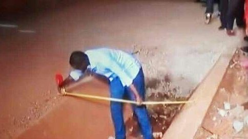 Canary Mugume trying to measure the distance between Kawempe and the hospital where Francis was taken for treatment