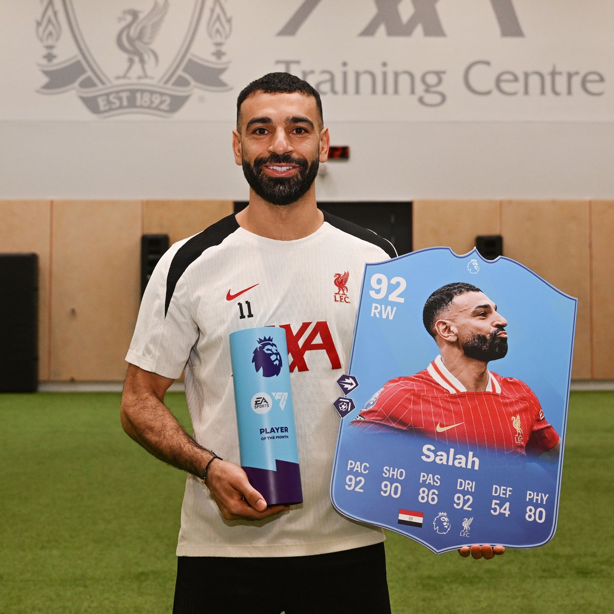 LFC's tweet photo. Another @premierleague record for the Egyptian King 👏

@MoSalah collects his Premier League Player of the Month award for a record-equalling seventh time 🤩