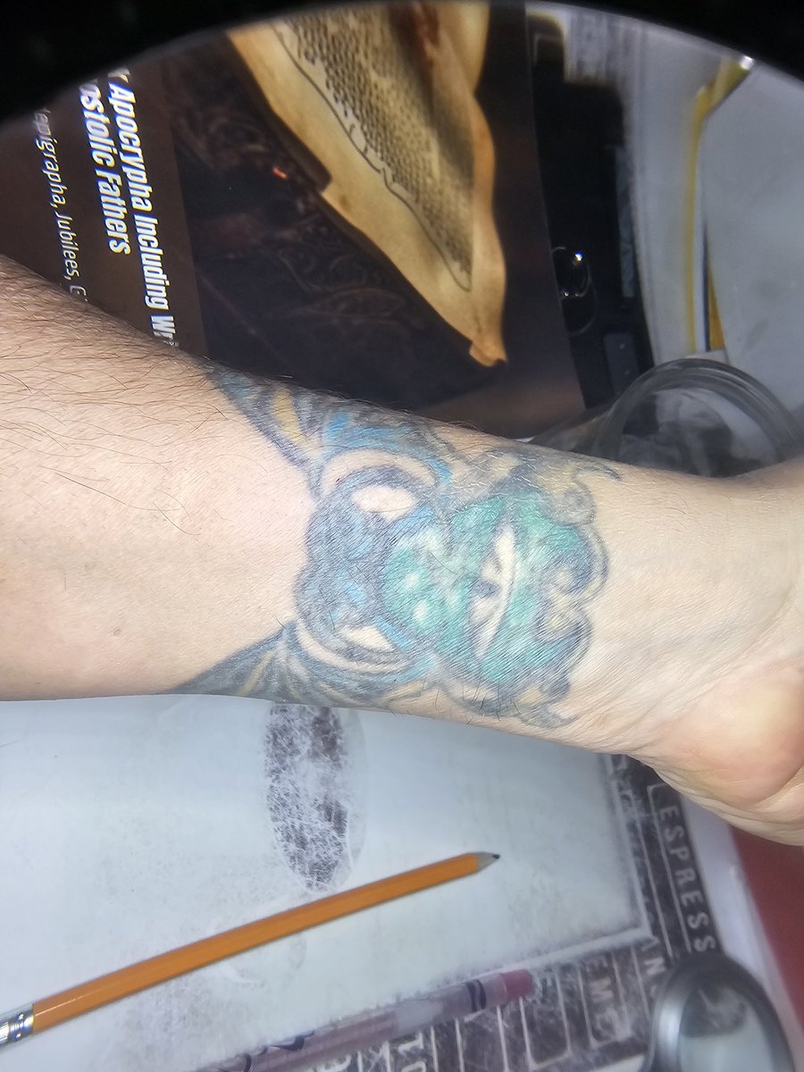 rcampagna63's tweet photo. I acquired the (musically) defined (dragon) imaged from an artist collection that a gentleman from the TATTOO shop at 17 and Rochester Rd. The artists (tsar) painted on my skin. I especially like the green and white he used. Of course, nearly 25 years later, whites fades.  17 and Rochester Rd in Rochester Hills Michigan.  Probable year: 1999 or early 2000.