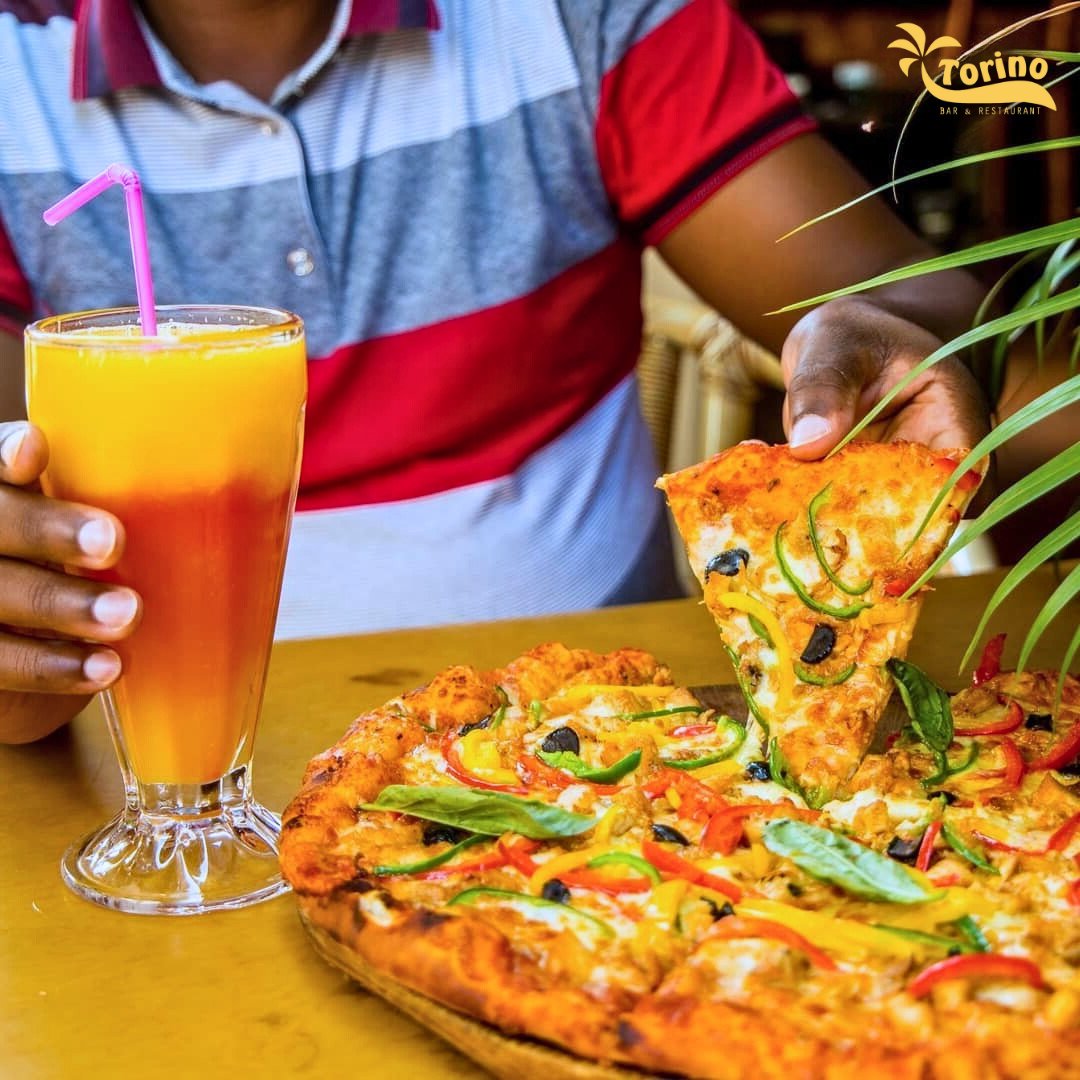 TorinoKampala's tweet image. Slice, slice, baby! 🍕🔥 The perfect pizza fix is waiting for you at Torino! 😋✨ #PizzaPerfection #CheesyGoodness #TorinoKampala