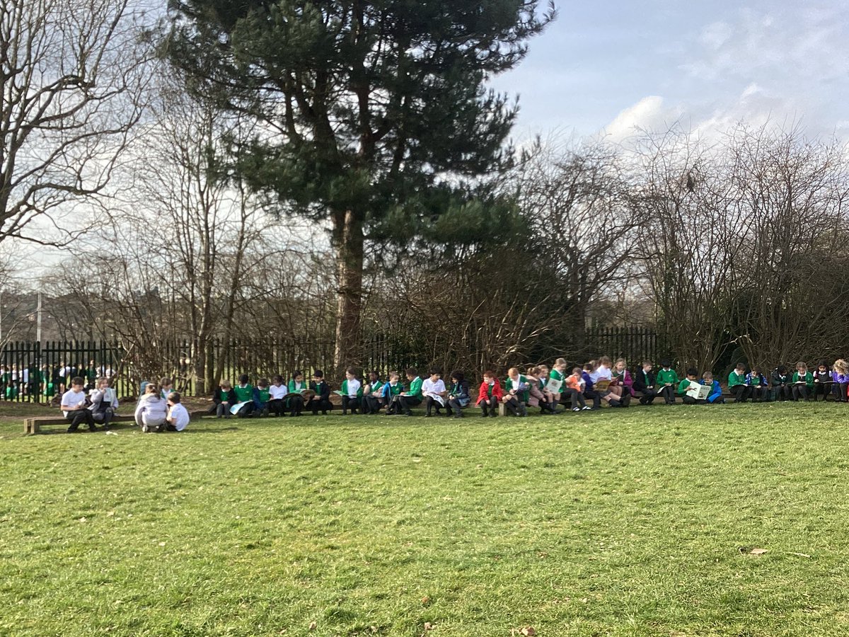whcps's tweet photo. Year 1 are having a great time completing buddy reading with Year 4 in the sunshine. Great to hear them reading to each other and discussing the stories so well. #whcyear1 #whcyear4 @WorldBookDayUK https://t.co/bPSJMpI83N