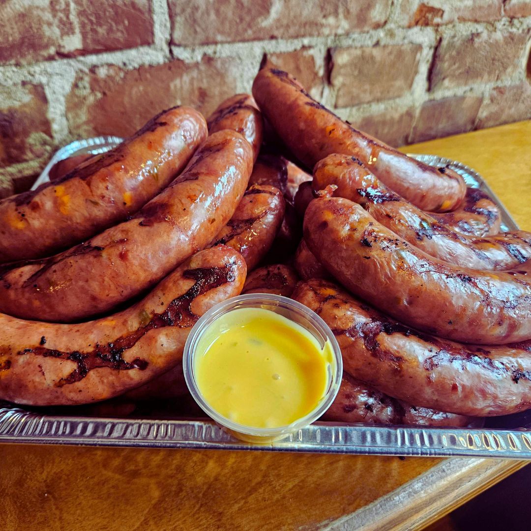 For Bockfest weekend only, exclusively from our Findlay Market location, we have a pork sausage, crafted by LK Cincinnati, seasoned with our dry rub, diced jalapenos, cheddar cheese, smoked, skewered, and served with a house made <a href="/rhinegeist/">Rhinegeist</a>  Truth beer cheese for $7 while