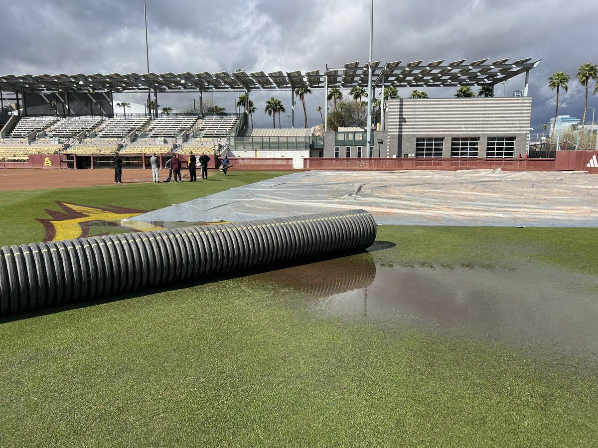 ASUGroundsCrew's tweet photo. It’s been a hectic day here in Tempe but we have a crew that digs deep at the toughest times and always finds a way! COMPLETE team effort today! Who says it doesn’t rain in Arizona? https://t.co/5CB14pRKTm