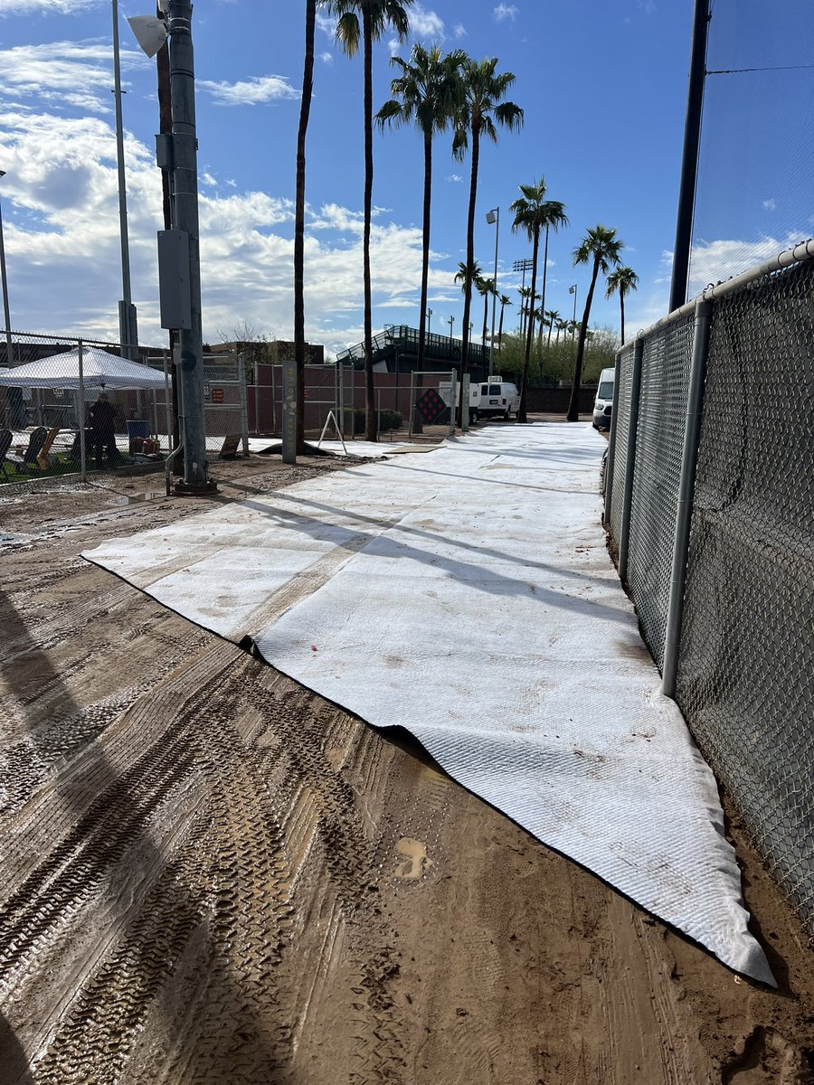 ASUGroundsCrew's tweet photo. It’s been a hectic day here in Tempe but we have a crew that digs deep at the toughest times and always finds a way! COMPLETE team effort today! Who says it doesn’t rain in Arizona? https://t.co/5CB14pRKTm