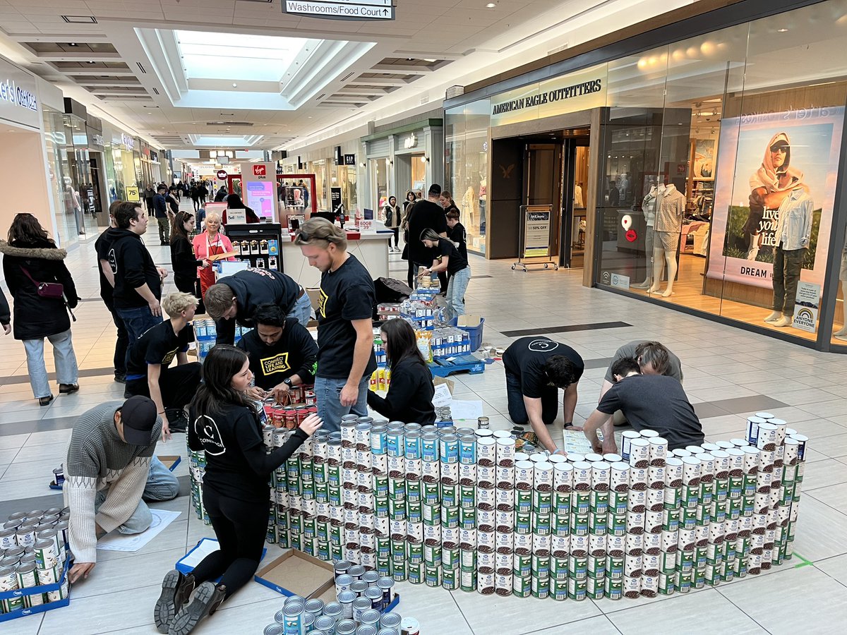 GerrardJim's tweet photo. @ACETconestoga is once again back at @Canstruction in support of the @FoodBankWatReg .  CAN you guess what we are building?  Go team ACET!!! #canstructionwr https://t.co/4rd90RVd4m