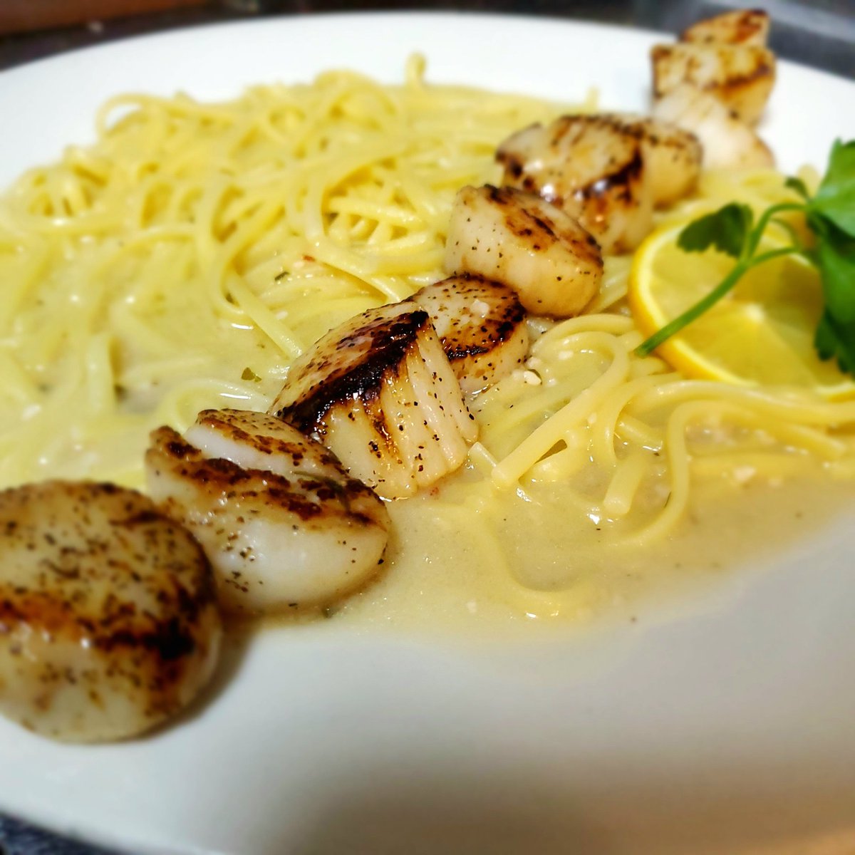iapizzapasta's tweet photo. 🍋🍝 Savor the flavors of our Seared Scallop Scampi. Perfectly caramelized scallops atop a bed of creamy lemon-infused pasta, garnished with fresh parsley. A dish that’s as elegant as it is delicious!  🥂✨ #Foodie #SearedScallops #PastaLovers #GourmetDining https://t.co/iJtODByUwP