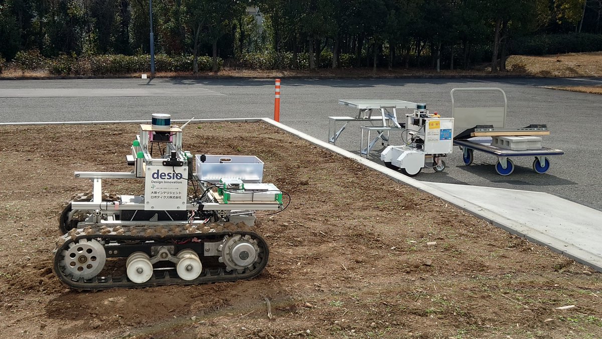 atan2sin's tweet photo. #大阪工業大学 #情報科学部 #DXフィールド オープニングイベント本日開催です！
https://t.co/jUCzMPg2s7
#農業支援 #ロボット #アグリムーバ もデモのために実験用農場でスタンバイです。
中型ロボットも応援します。
#ものづくり https://t.co/phV7dPUGc2
