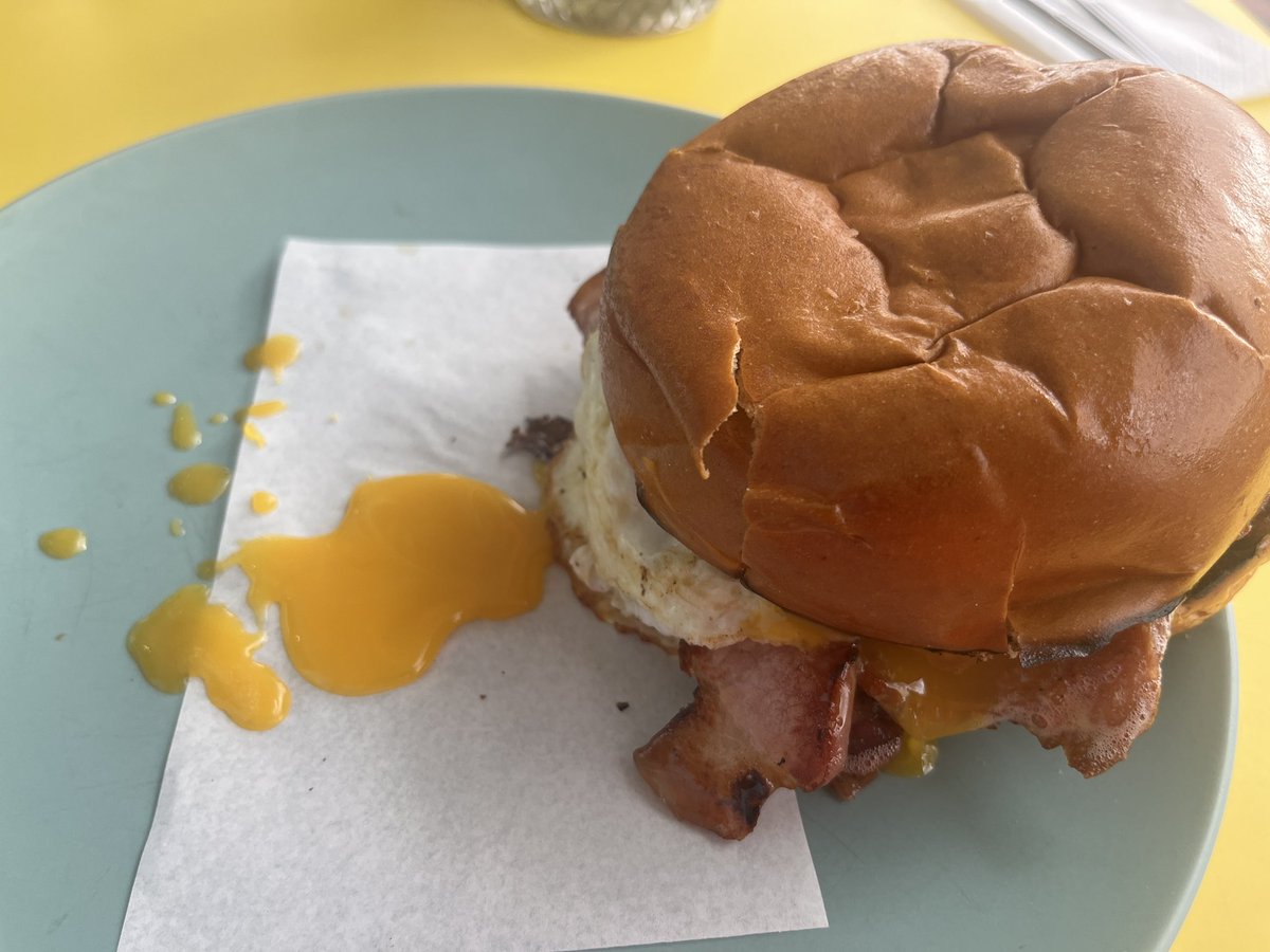 Question. Should the eggs in a bacon and egg roll be cooked to the point where they don’t splurk all over you when you bite in? Or are runny yolks worth the mess?