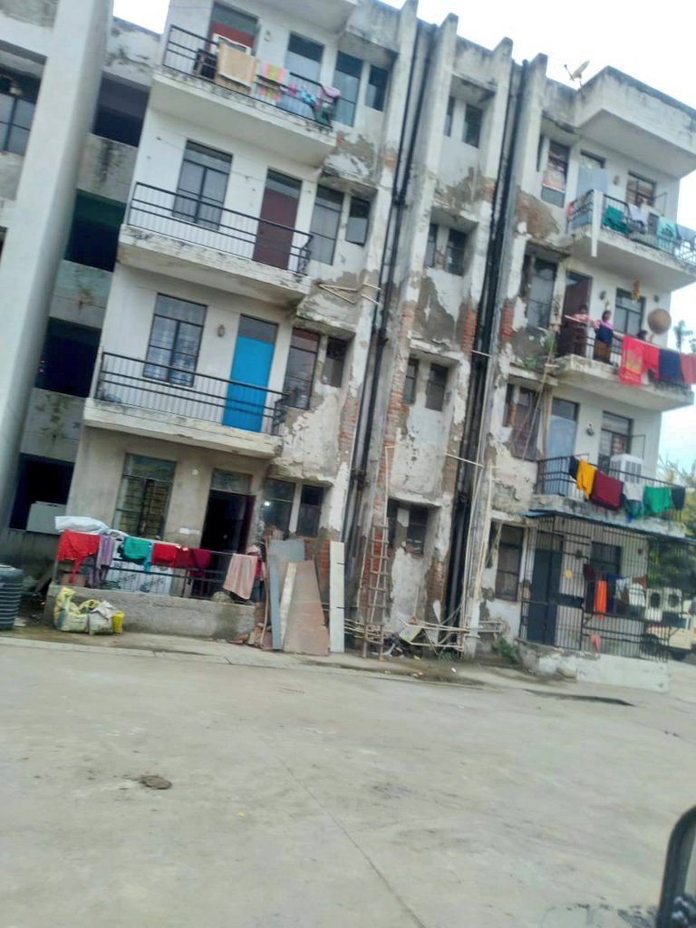 prchandna's tweet photo. @noida_authority @nisharai_ggc @RISENOIDA @beniwalgs @GSB84158560 @cfonoida @fireserviceup @ChiefSecyUP @Secretary_MoHUA @IIDGoUP @FONAA_GBN @CP_Noida @rashmip1 @DineshSAmethi @swatiagrwlsingh @ColonelPChandra @GarimaTri20 @jan_jagran @Salaria_Shikha1 @RanjanTomar @CeoNoida @myogiadityanath @InduPrakashPCS @rituias2003 @Joginde54161227 @cjain9 @777Gautam @3CLPFBA @Namitaangelite @iamIM16275 @PJP_2013 @BJP4UP @NavbharatTimes @NandiGuptaBJP @lalclicks @TOINoida @dmgbnagar @noidapolice @DCP_Noida @DCPCentralNoida @ADCPNoida @NDRFHQ @dgpup @homeupgov @CMOfficeUP @aajkanoida @aajtak @abhishek_nefowa Re-iterated that your response is unscientific w/o substantiating. It be noted that as per @IndianStandards life of RCC is around >90 years. But this building constructed by @noida_authority has gone dilapidated to this level in <15 years.#BadWorkmanship. Waiting for fatality. https://t.co/5YHwm9DWzL