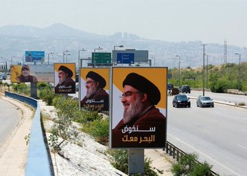 وزير الداخلية اللبنانية يأمر  بإزالة جميع صور حسن نصرالله على طريق المطار