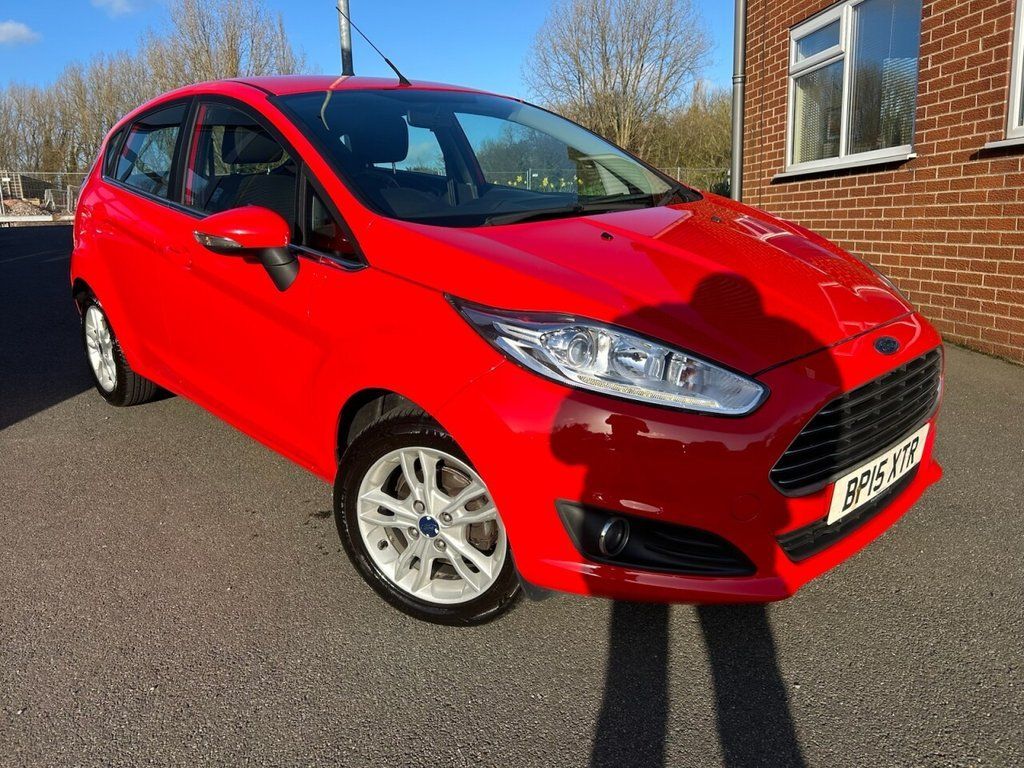 This great value 2015 '15' Ford Fiesta 1.0t Zetec is available now at Hill and Swift. It has only covered 80,000 miles from new. This ideal first car comes with Bluetooth, electric front windows and mirrors and DAB radio. Phone Mark on 01785 813332 to buy this Fiesta today.