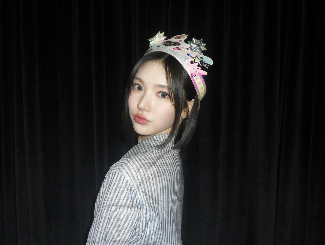 soft moonlight kisses my short dark hair, while my eyes hold a universe of sparkling stars, pretty and dreamy, just like a fairytale.