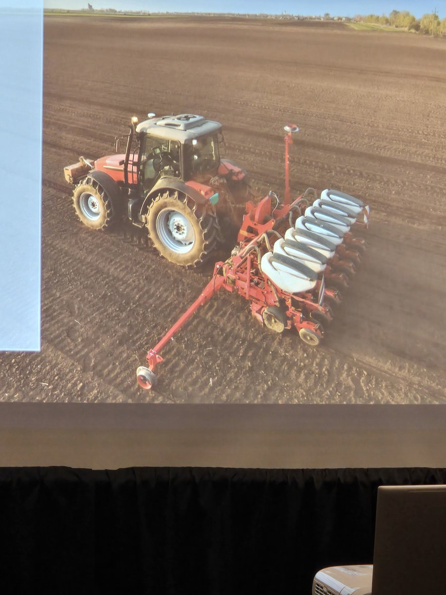 A new stock photo found in the wild featuring a 7 row planter.