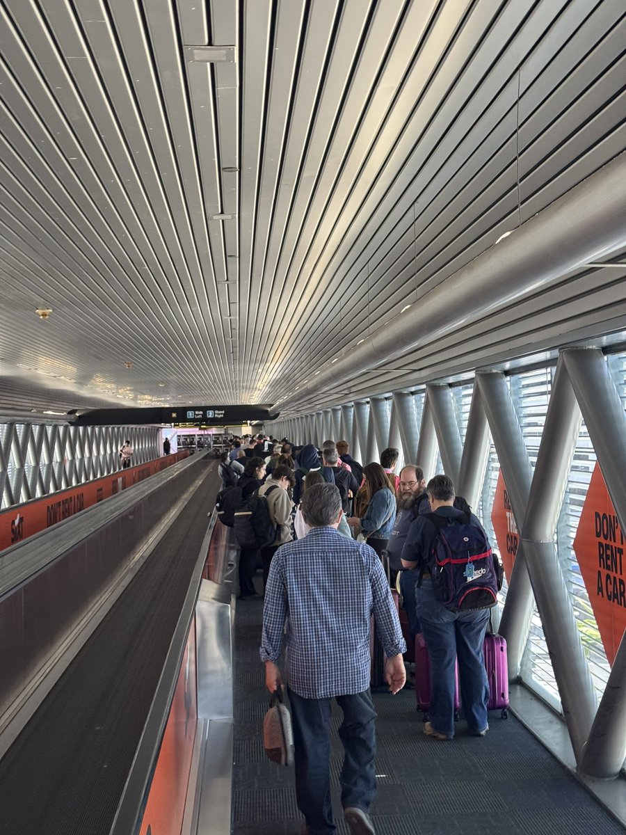 alaskanjackal's tweet photo. @iflymia This is the wait for the shuttle bus to the rental car center?? If you’re going to shut down the MIA Mover, you have GOT to plan better than this for replacement shuttles. https://t.co/F6xObu8Jum