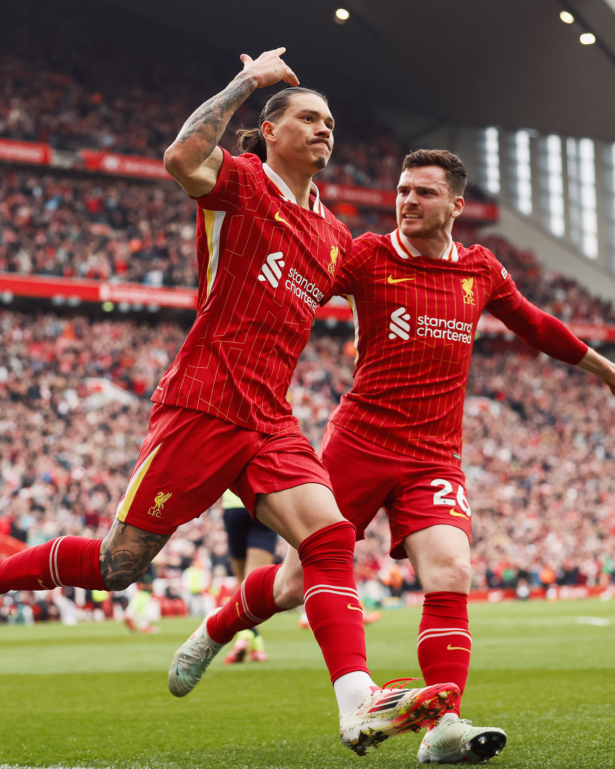 Nunez celebrates his goal with Robertson.