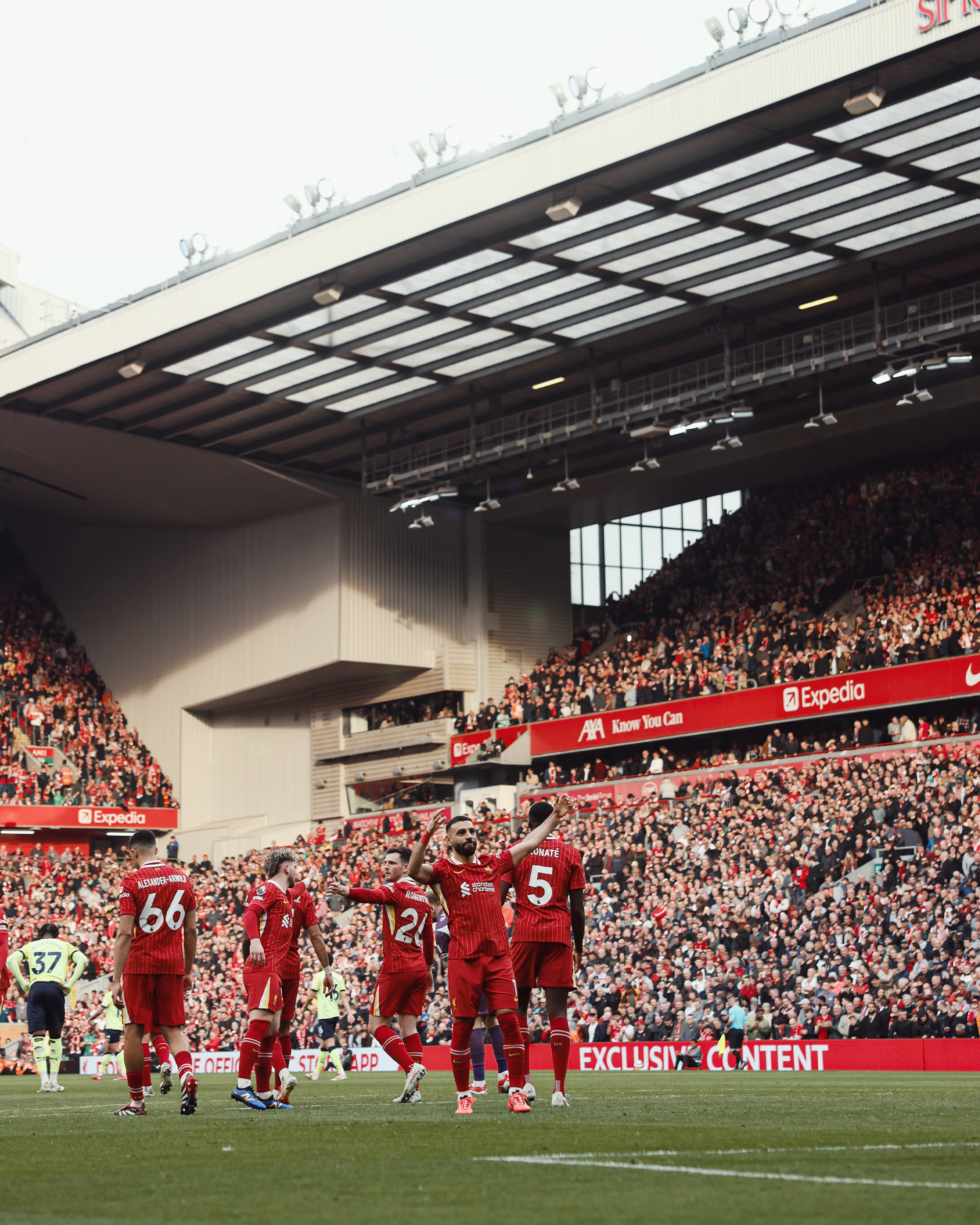 Salah celebrates scoring.
