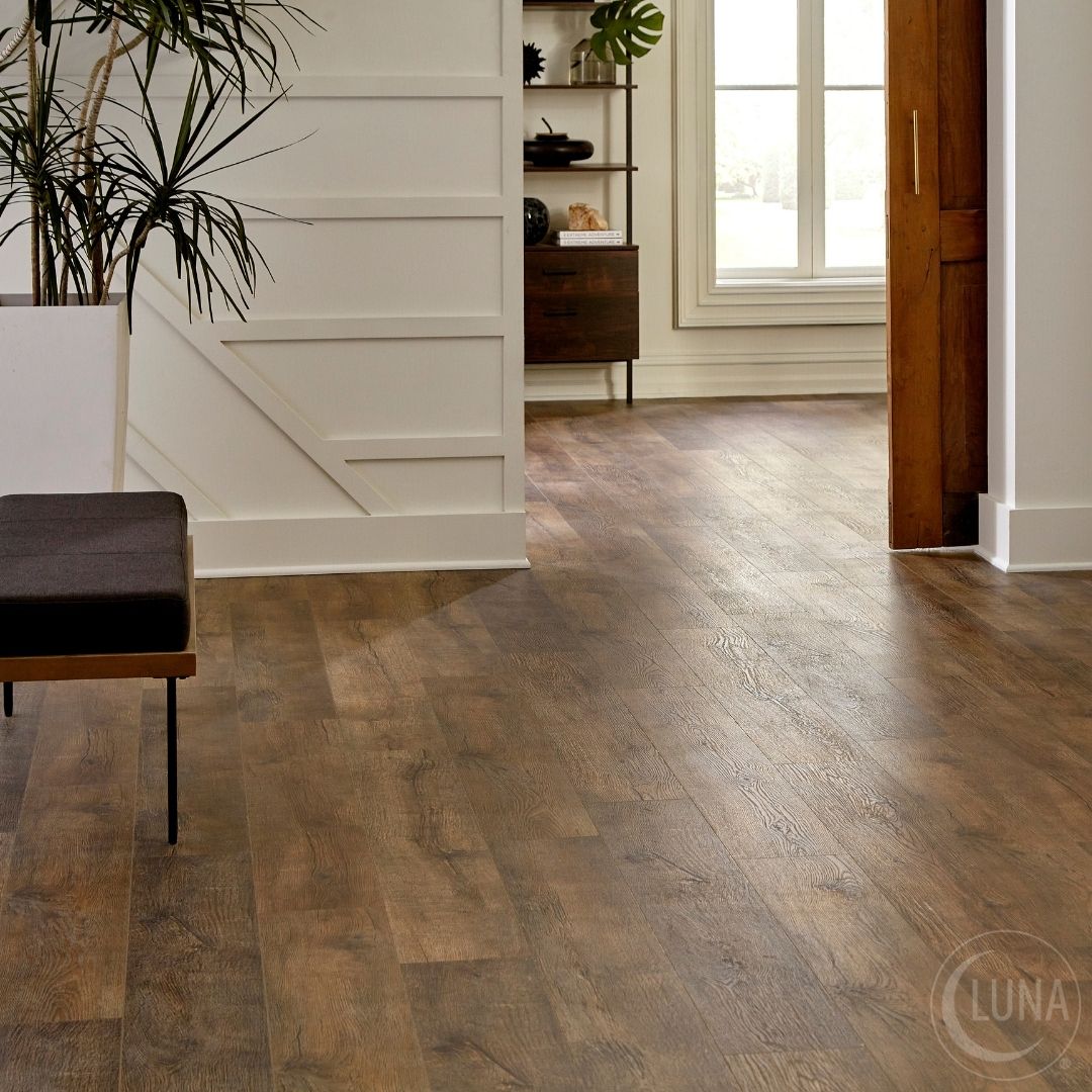 The durability of laminate, the beauty of hardwood. Trilogy’s natural oak finish is water-resistant, scratch-resistant, and textured for an authentic wood grain look that lasts.

FLOOR TYPE: Laminate
STYLE: Trilogy
COLOR: Ebony

bit.ly/43uyQZl

#LunaFlooring #laminate