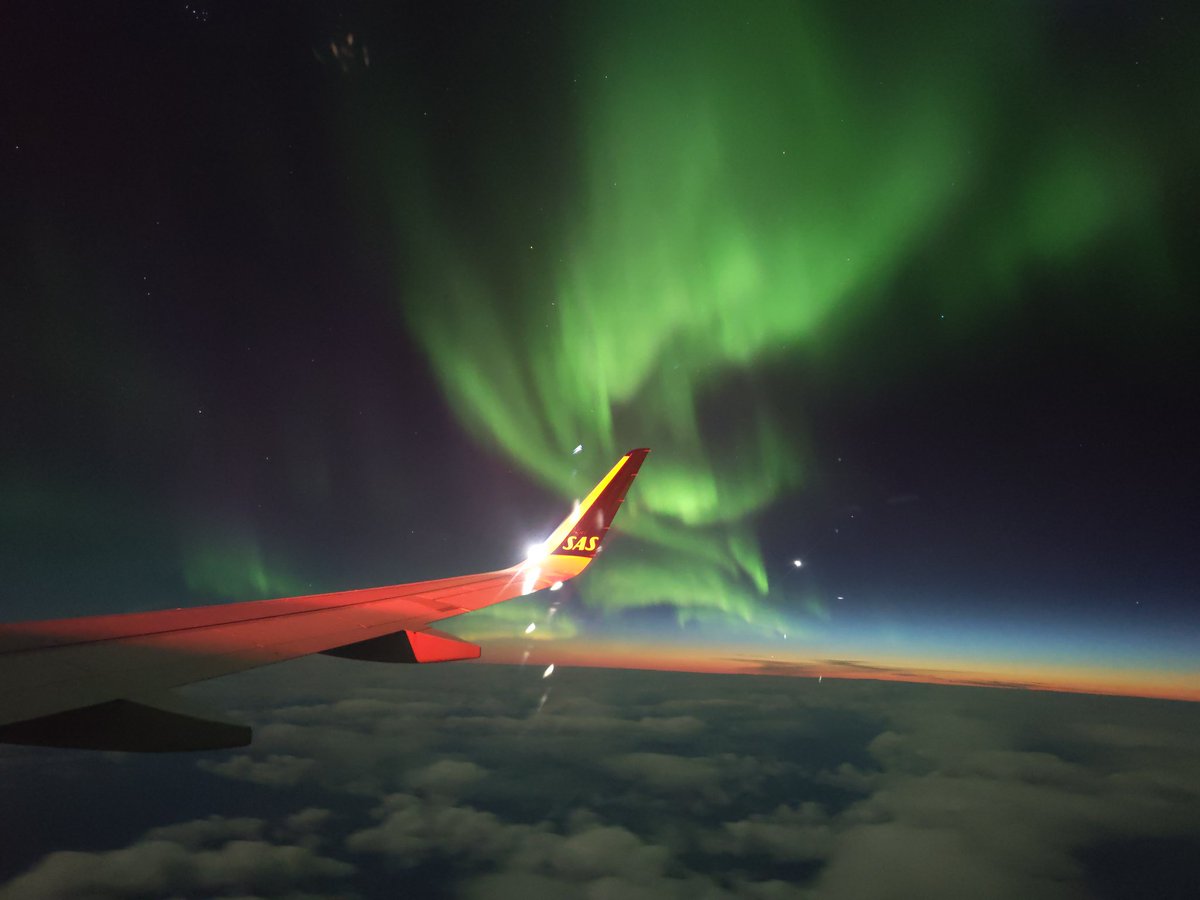 Aurora from the plane on the way back from Svalbard fieldwork... Just amazing