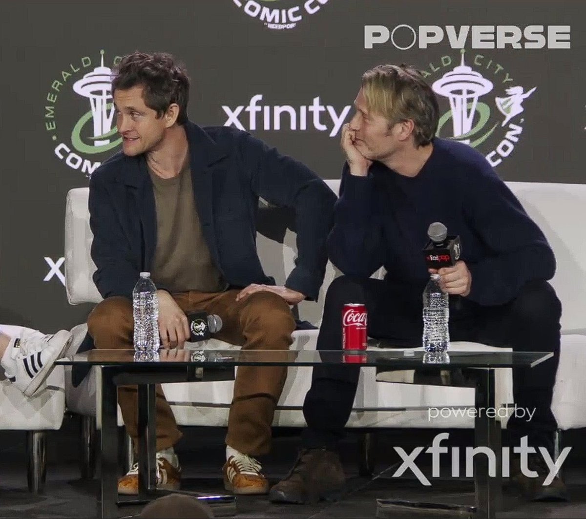 Metaphysicalash's tweet image. The amount of screenshots I took of the panel 🙈I love the whole thing! ❤️❤️ It was so endearing. And every frame was funny, their expressions are such gold✨
The first two pictures looks like Mads sneaking a peek at Hugh and then looking away when he&apos;s caught 😅 #ECCC