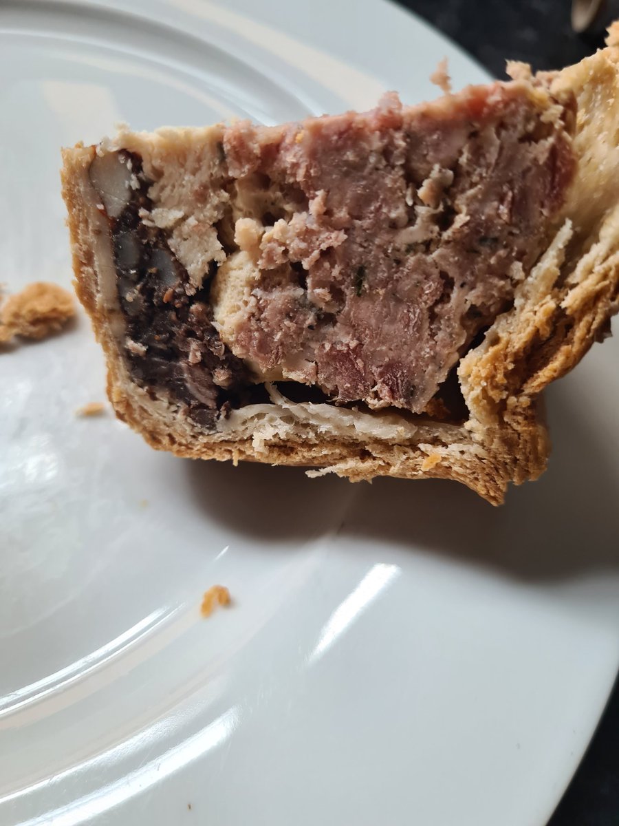 thelifeofpies's tweet image. Behold the Countryman pie from Staffordshire Butchers. Pork, chilli jam, chicken breast &amp;amp; black pudding. A beast of a pie with a cracking bit of layering. Pork is lightly seasoned with sage and pepper, the fruity chilli jam is subtly mixed in with the black pudding #pie #porkpie