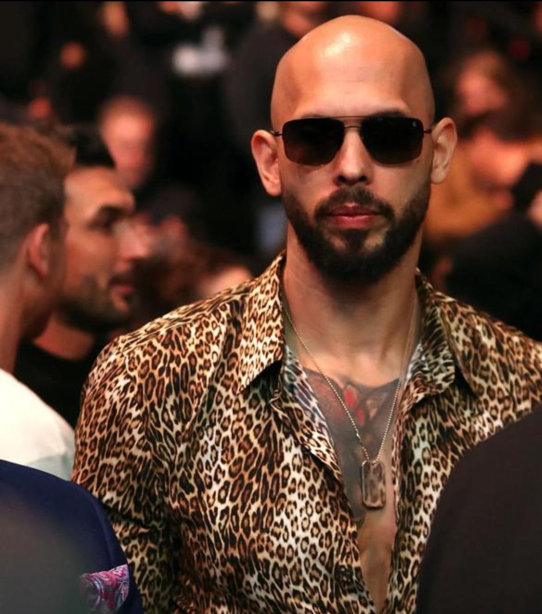 Andrew Tate is part of the club...

Notice how he's wearing a cheetah print shirt when he was at UFC 313. This is showing his allegiance to MK ultra and being a s*x slave. (S*x kitten.)
