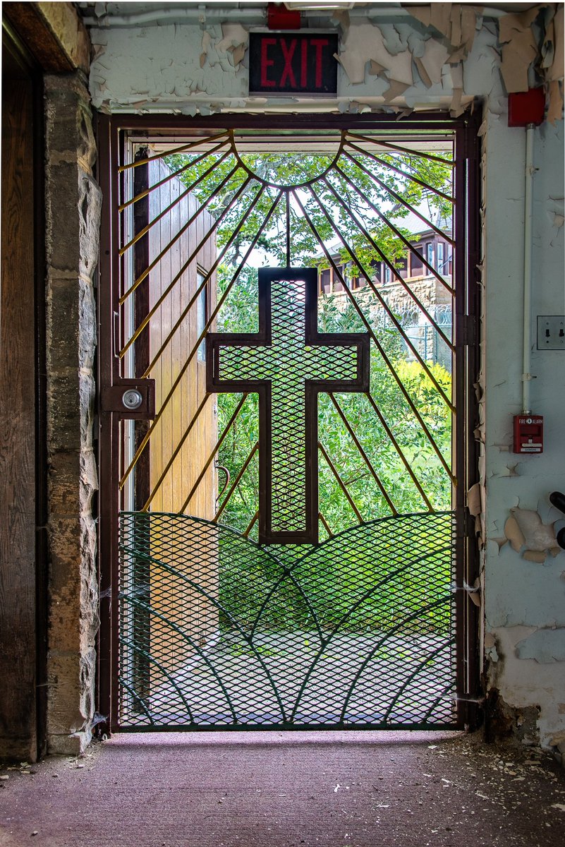 The wrought iron door of the entrance to the chapel of an abandoned prison in Pennsylvania.