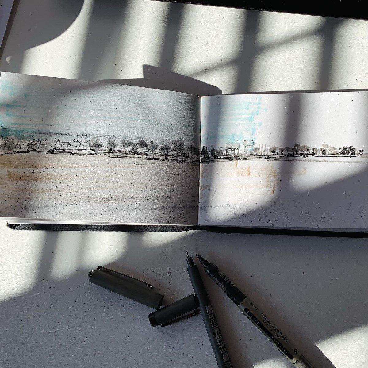 The North Walsham water towers greeted me as I neared the end of yesterday’s walk. 
#dailydrawing #landscape #sketch #ArtistOnTwitter #ArtistonX #thedailysketch