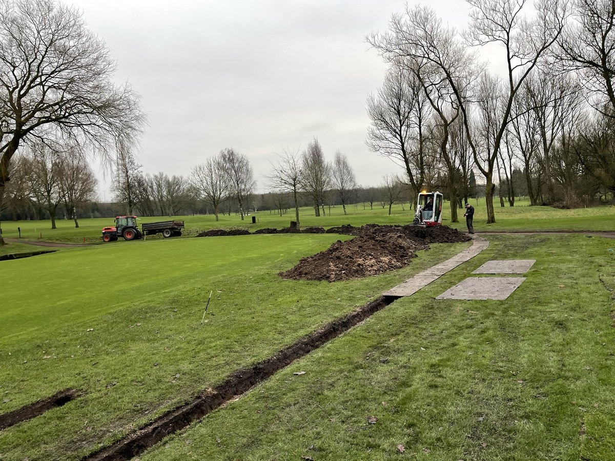 kenston2000's tweet photo. 4th green bank reshaped @DentonGolfClub. New drain installed at base of the slope to catch rainwater runoff. This should be drier all year round and more resilient to golfer traffic due to better quality soil (sandy rootzone) and grasses. Back in play by end of May. https://t.co/BqZ7NLrbWT
