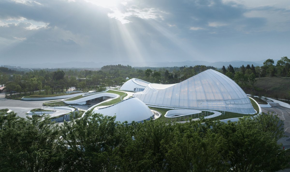 ArchDaily's tweet image. The Botanic #Pavilion draws inspiration from the seed, symbolizing growth and potential. Rooted in the earth, its #design integrates exhibition and environment, creating a dynamic space where form, nature, and storytelling merge. ow.ly/Yvc250VeBur