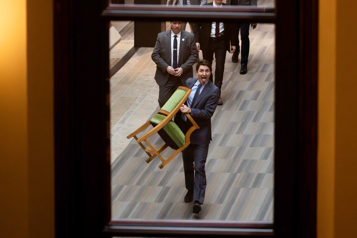 Canada's Prime Minister Justin Trudeau carries his chair from the House of Commons on Parliament Hill in Ottawa, Ontario, Canada, on March 10, 2025. Photo for <a href="/Reuters/">Reuters</a>