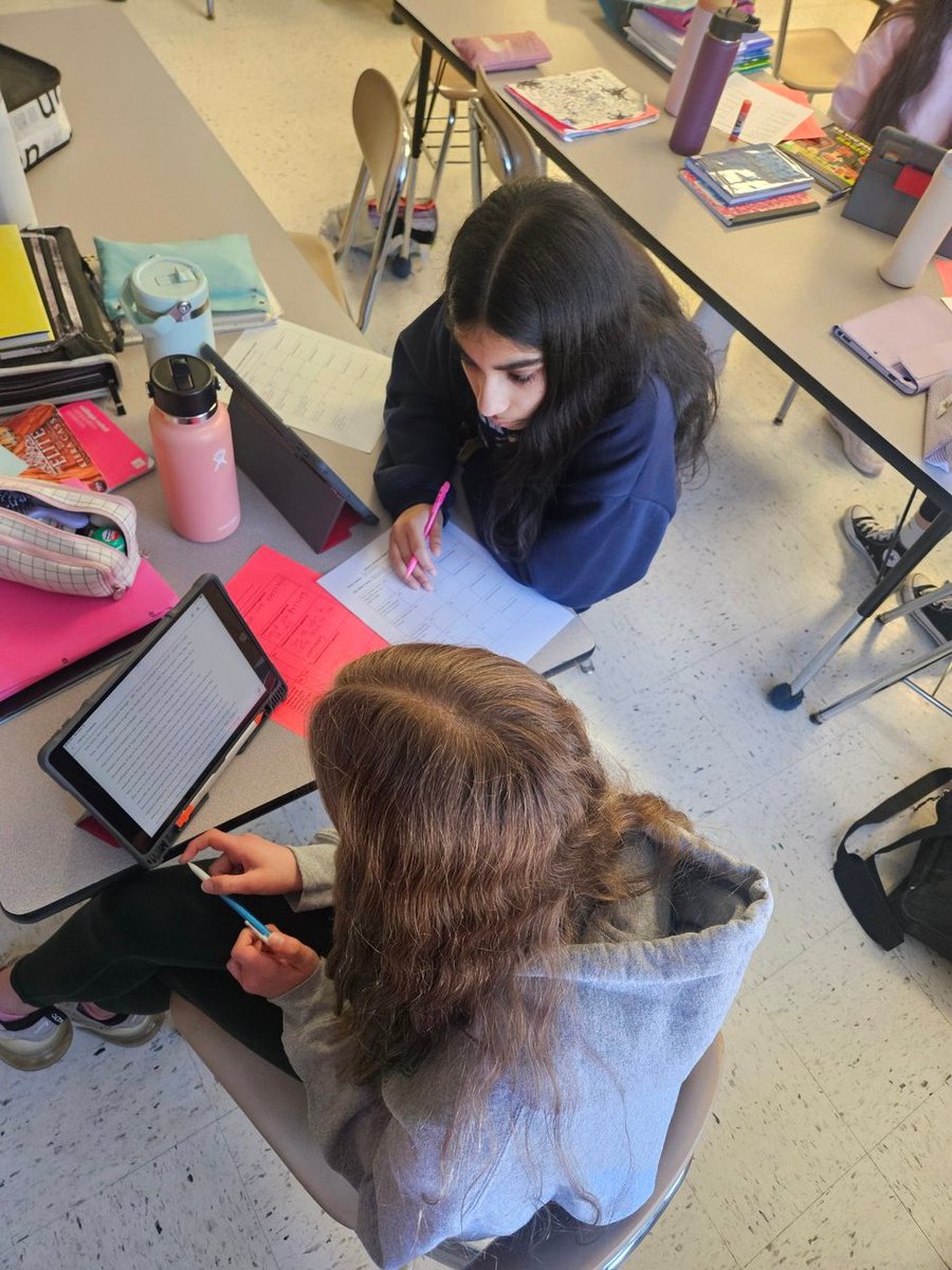 The classroom is buzzing as students read their drafts aloud to a peer who is using a checklist to make sure all the right ingredients are included to create an excellent literary analysis <a href="/barrington220/">Barrington 220</a>