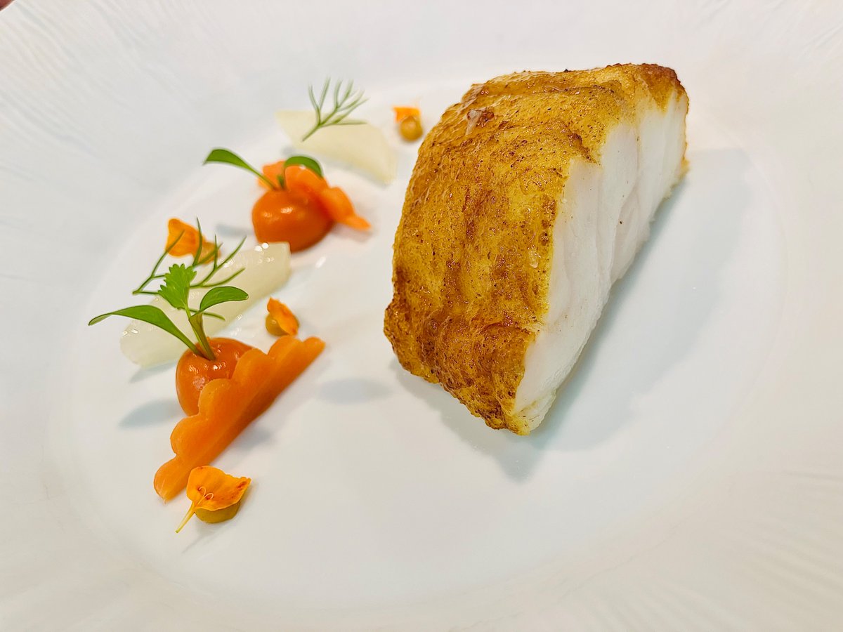 Monkfish tail roasted on the bone with brown butter, spices and curry leaves.
Confit fennel, pickled sand carrots, preserved lime condiment, finished with a curry and mussel butter sauce.