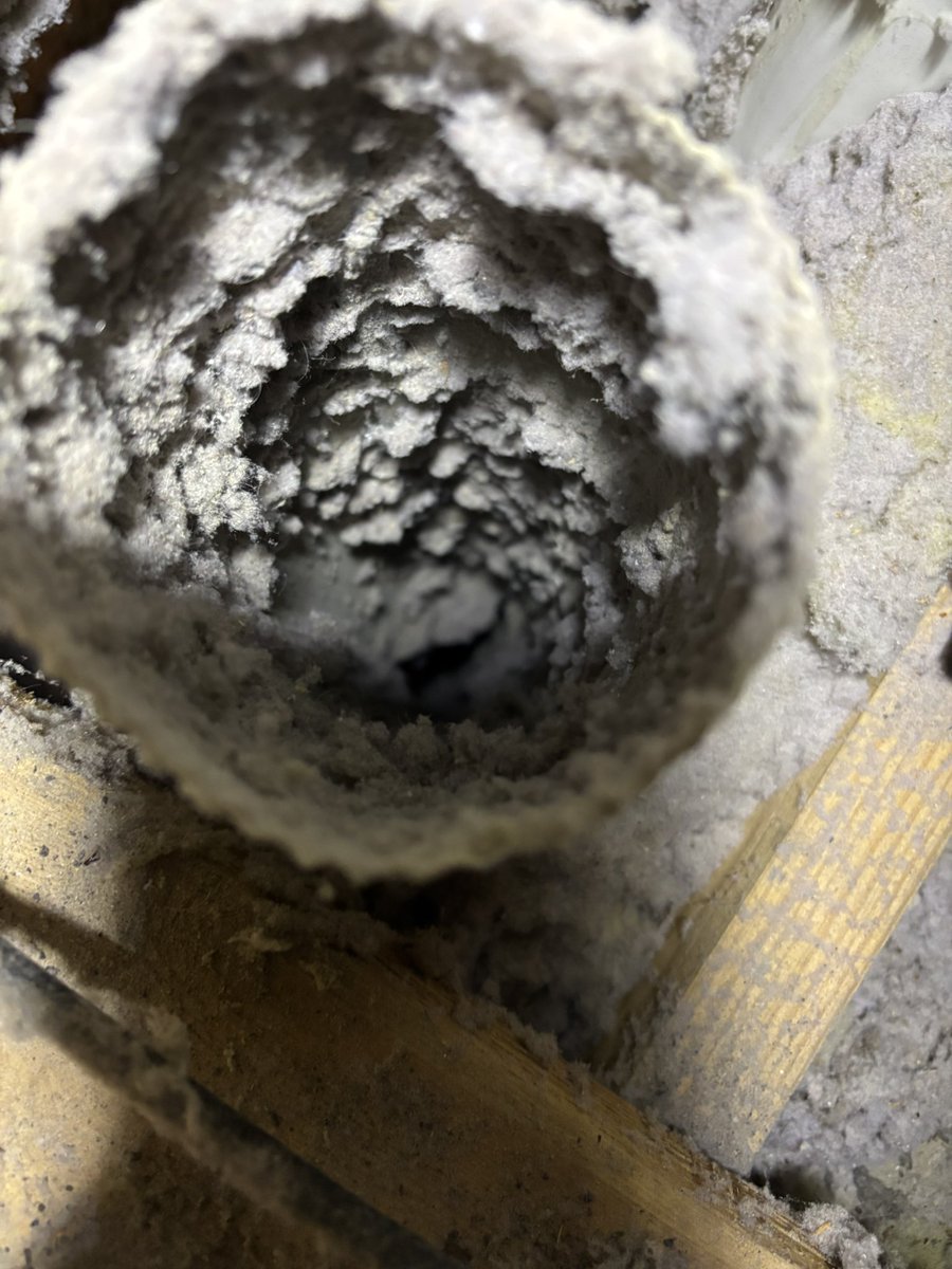NilesBeers's tweet photo. While inspecting the ductwork in this attic, we actually came across this vertical dryer vent that was completely stopped up! We took it apart and cleaned it from the dryer to the roof vent, and now we can see daylight again! The dryer will be drying WAAAYY faster now! https://t.co/JmB3yb5006
