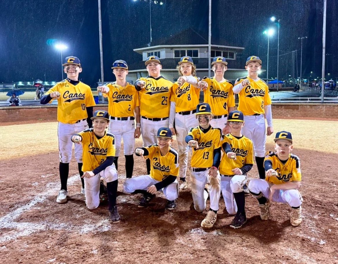 Canes SE 13U Oxford collecting Championship hardware. 🏆