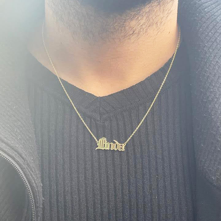NeoCityGarden's tweet photo. Bold. Masculine. Yours. Customize your 18K gold name necklace, crafted with a matte finish and gothic font for a strong, masculine edge. 

 #MensGoldJewelry #CustomForHim https://t.co/4uRD6lCO7o