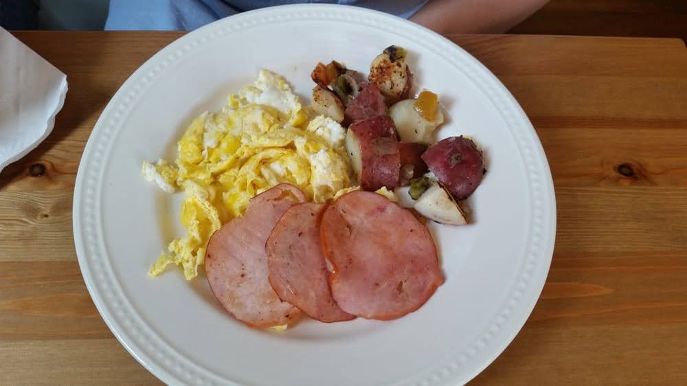 What's your favorite breakfast? Here we have scrambled eggs, potatoes and some Canadian bacon. 

Come in so we can fix you a plate!