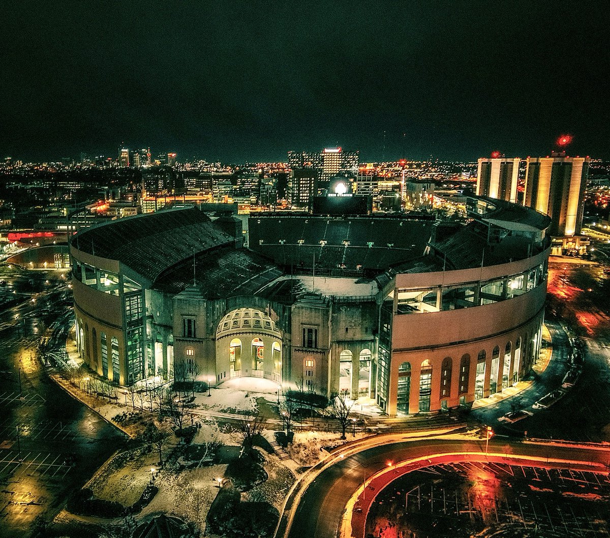 OhioState's tweet photo. The city lights around The 'Shoe are shining bright. ✨

📸: 6drone4 on IG https://t.co/IBch7yGqek