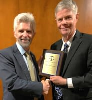 On 3/7/25 Chief Judge Thomas Logue received the Florida International University College of Law 2025 Judicial Excellence Award from Dean Antony Page.