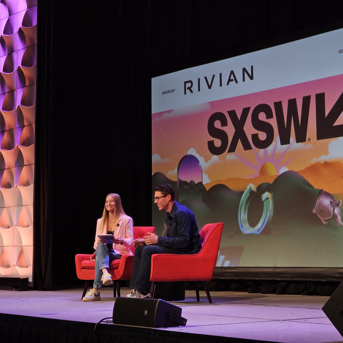 Kara Carlson- karacarlson.bsky.social (@karacarlson2) on Twitter photo Rivian CEO <a href="/RJScaringe/">RJ Scaringe</a> is on stage at SXSW talking the past present and figure of Rivian and the EV indudtry Rivian CEO <a href="/RJScaringe/">RJ Scaringe</a> is on stage at SXSW talking the past present and figure of Rivian and the EV indudtry