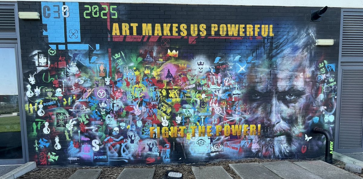 Mrs_H11's tweet image. Art makes us powerful is the message from Y8 on our school exterior wall, in collaboration with an amazing graffiti artist Phil Padfield.