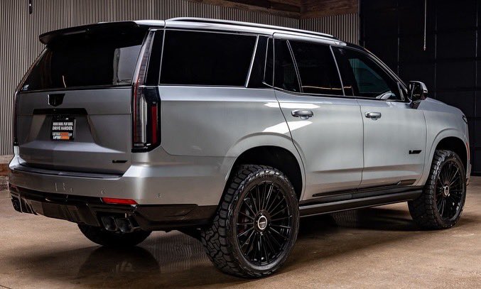 liftedtrucks's tweet image. 2025 Cadillac #Escalade. Beautiful! #TX04077 
 
* Gloss black tuxedo roof, black out emblem package with lighted front 
* 2” air ride lift 
* 24” @vossenwheels  
* @NittoTire Recon Grapplers 

*Sold. Others to choose from! (833) 640-2740 for current inventory or live chat at