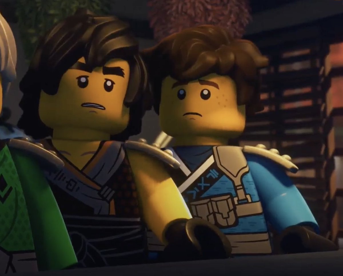 black cat and sad puppy