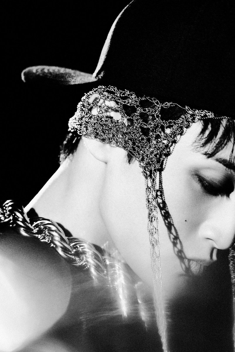 behind the gleam of silver and the weight of chains, there’s a fire that won’t dim. you see the glare, the snarl, the sharp edges—but do you see the story woven between the strands of lace and metal? every piece i wear, every gaze i throw, it’s a statement.