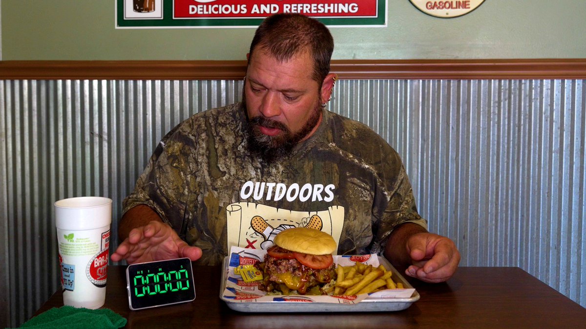 youtu.be/-pXSjzTTJIY
The Bar B Que Station in Independence, LA I came across the Ultimate Burger Challenge.  Has 2lbs of burger, .5lbs of brisket, 10 slices bacon, cheddar cheese on a toasted bun accompanied  with lettuce, pickle &amp; tomato smothered w/ delicious bbq sauce
