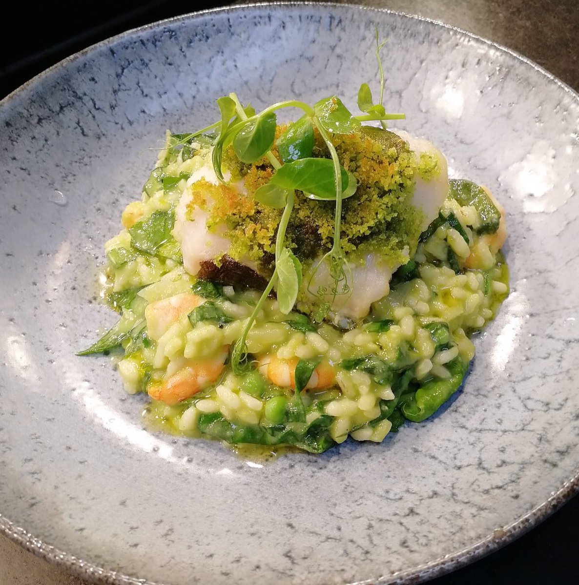 Pesto crusted cod on a pea prawn and locally foraged wild garlic risotto #aldeburgh #suffolk