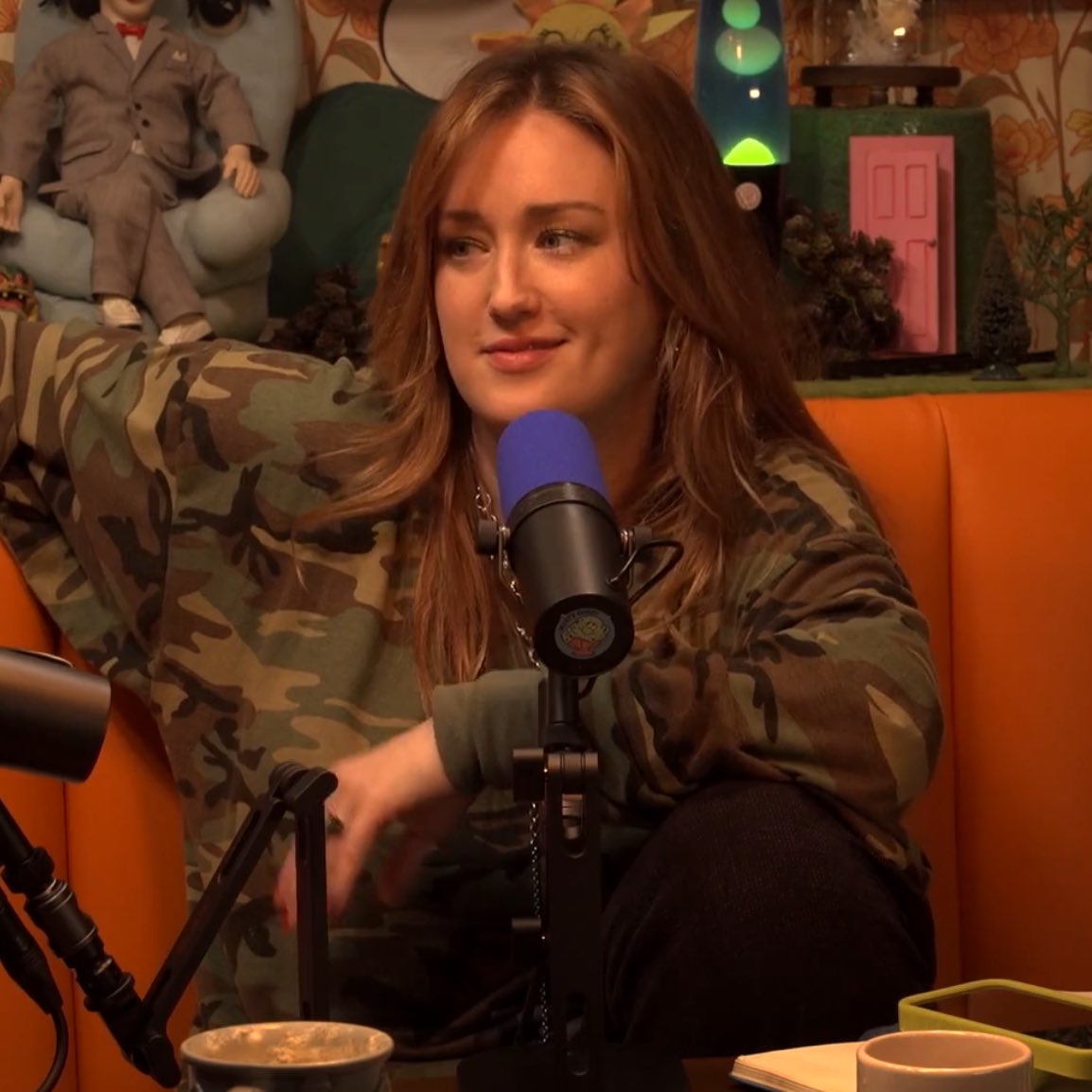 sitting like she wants to attract women (its working) (i'm women)