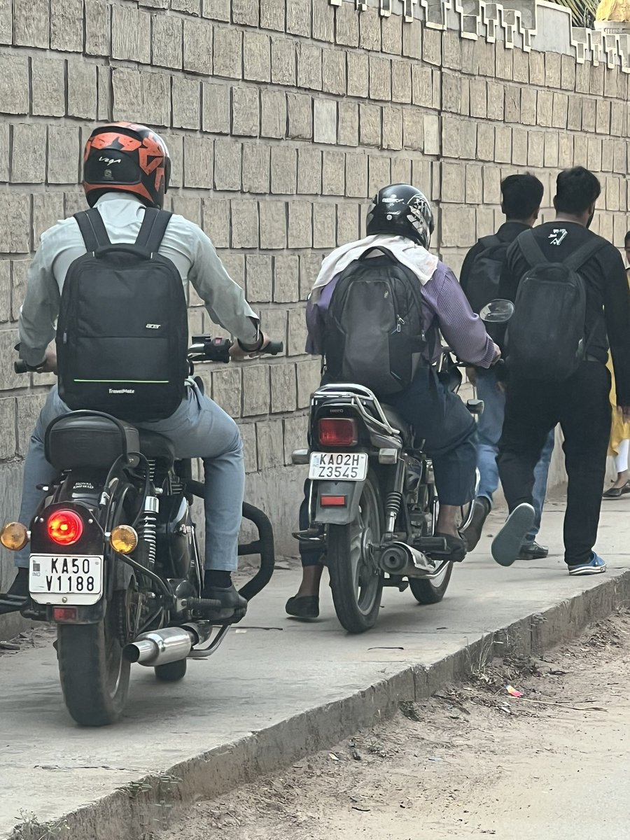 kumarkenchappa's tweet photo. Where is the place for pedestrians? Everyday story this from Kodigehalli gate towards hebbal . Recently one of this bikers hit a doctor who was rushing to reach hospital in time . @blrcitytraffic @hebbaltrafficps @Jointcptraffic https://t.co/LucrKCw8Qq