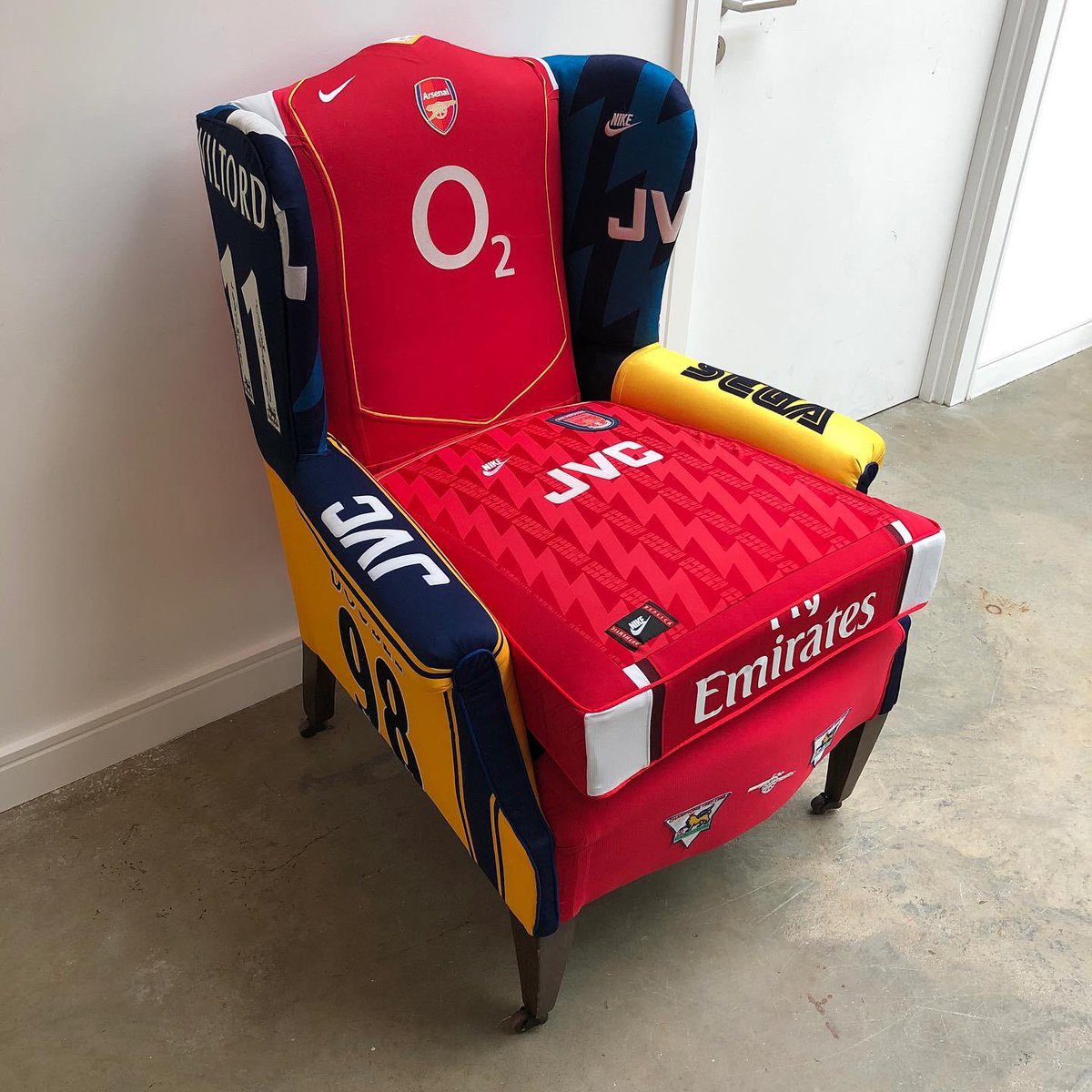 DPR_14's tweet photo. @Arsenal My wingback ‘Chair of Champions’ made from all my childhood / teenage kits ⚽️ 🪑 🏆 https://t.co/NGRVgGZKAG