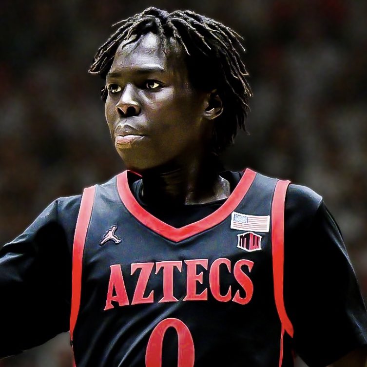 CBBcontent's tweet photo. NEWS: 7’0 San Diego State transfer Magoon Gwath is in contact with Kentucky, Michigan &amp; Washington, he told me. 

Averaged 8.5 PPG, 5.2 RPG &amp; 2.6 BPG as a redshirt freshman. Mountain West Defensive Player of the Year. https://t.co/7jCdwnBWw4